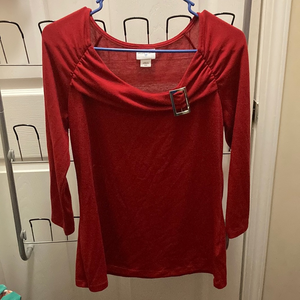 Jaclyn Smith red shirt